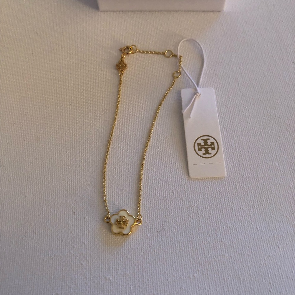 Tory Burch Gold and White Flower Charm Bracelet